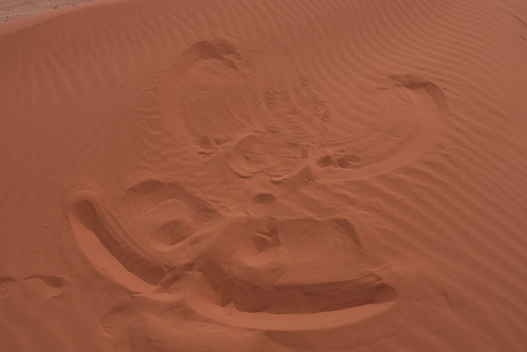 Sand angel, a lot warmer to do than snow angels!